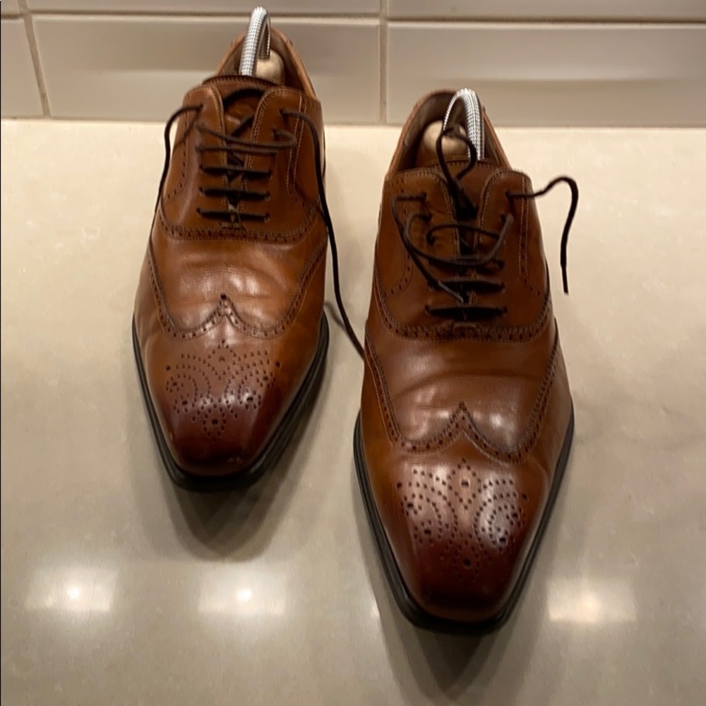 Dress shoe:  wingtip.  Made Spain